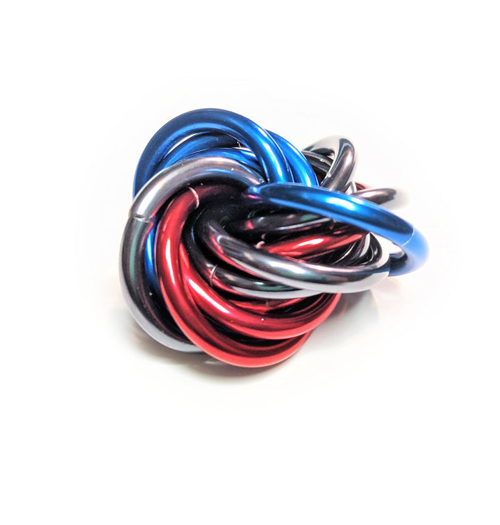 Multicolor metal fidget ball with braided loops, blue red black and silver