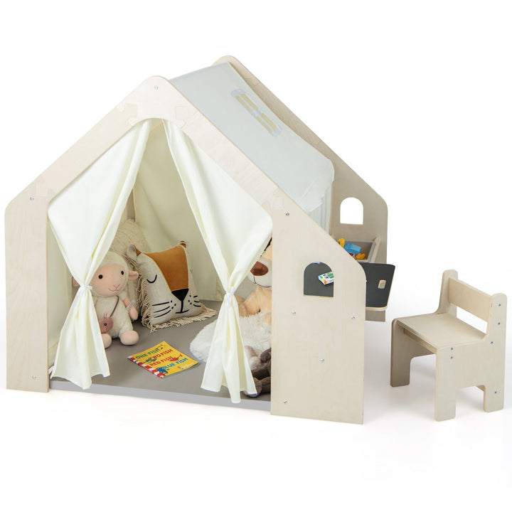 Beige wooden playhouse with white curtains, chalkboard side panel, and small chair