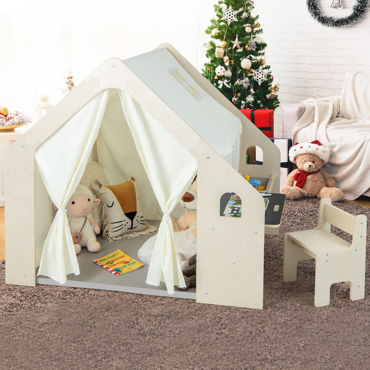 Beige Montessori playhouse with white curtains and open storage bin for toddlers