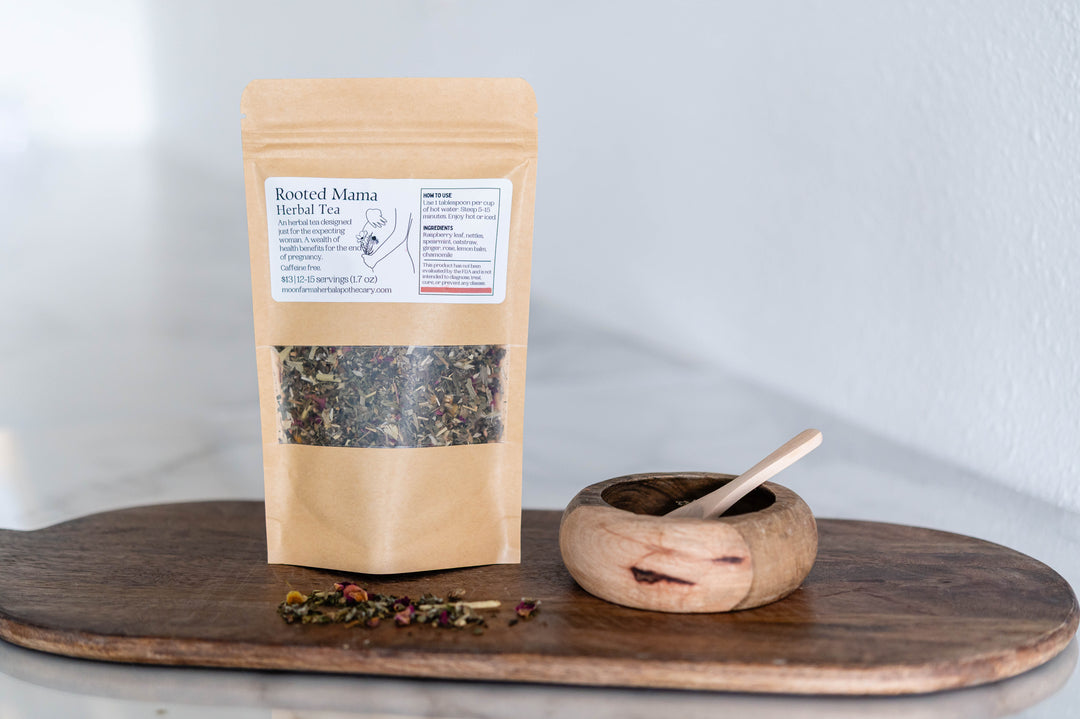 Rooted Mama herbal tea pouch with loose tea blend in resealable bag