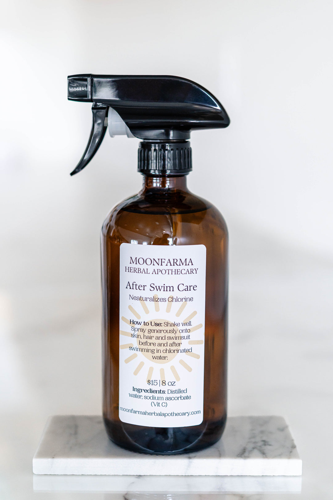 MOONFARMA After Swim Care amber glass spray bottle with black trigger