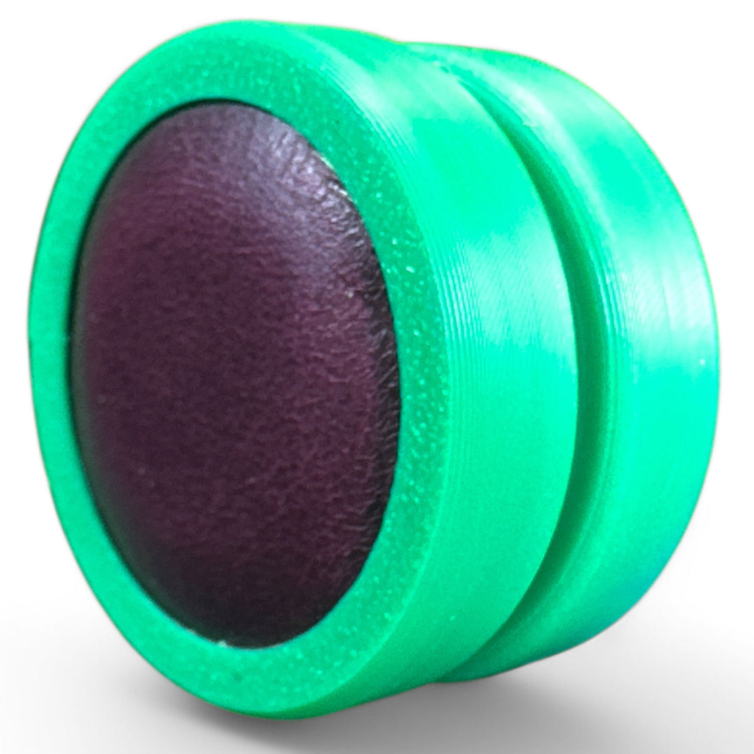 Fidget toy moon discs, dark purple inner with green outer, stacked pair