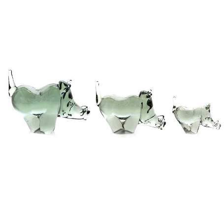 Green recycled glass warthog figurine, side view with raised trunk and pointed ears.