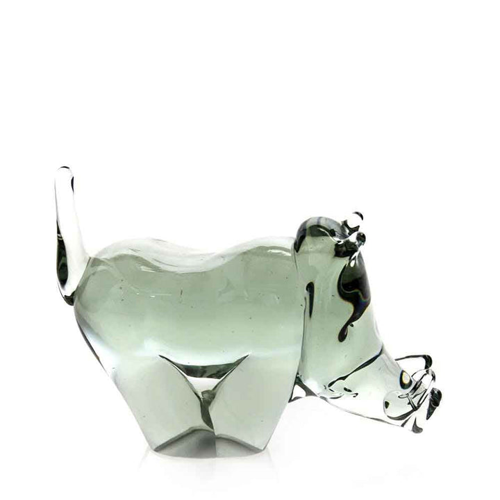 Green recycled glass warthog figurine, three-quarter view showing back and tail.