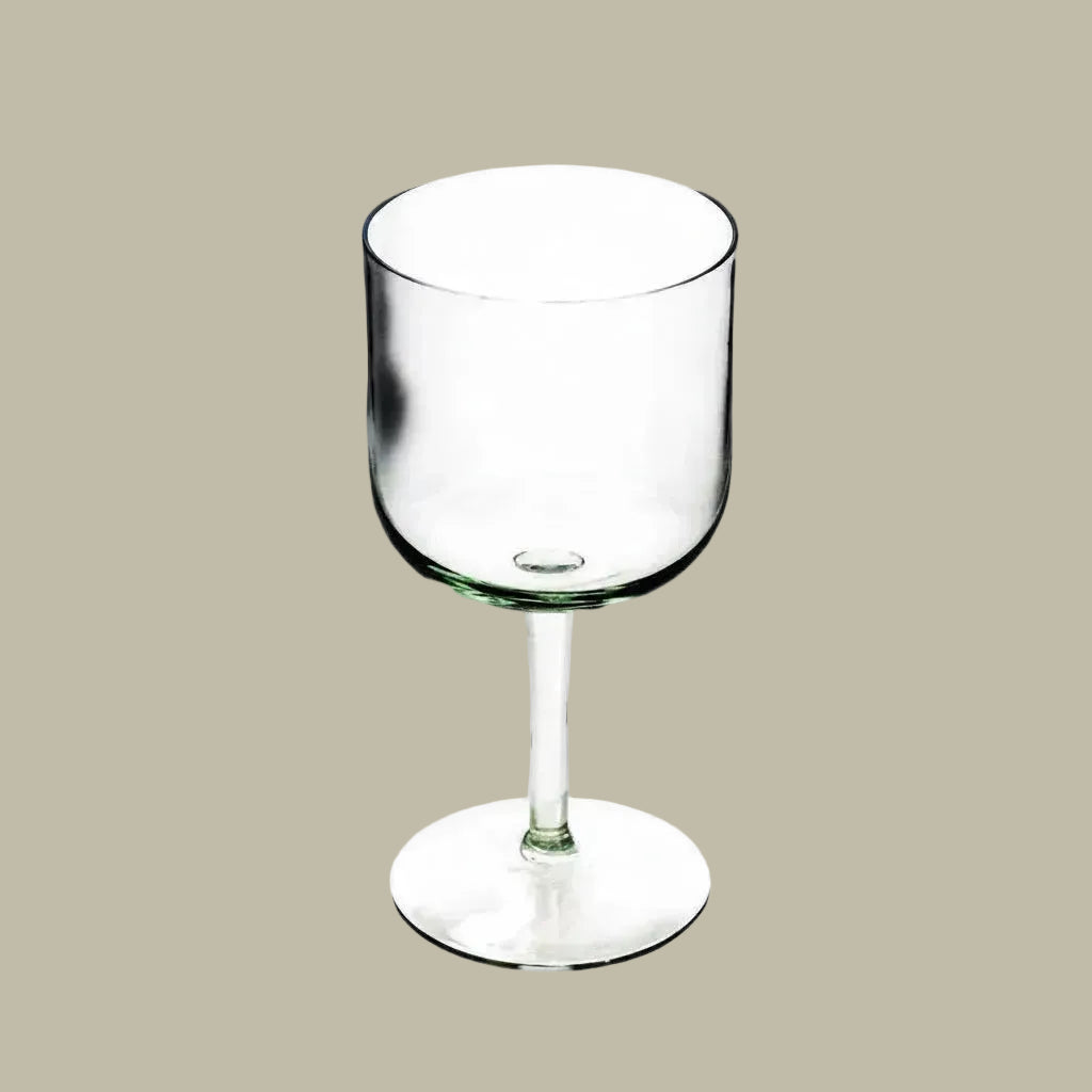 Stemmed wine glass with clear glass bowl and short foot