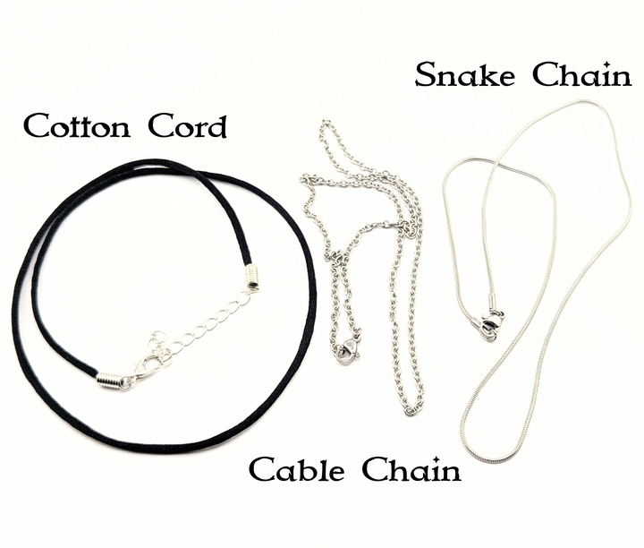 Rainbow ring fidget jewelry with black cord, stainless cable chain, and snake chain
