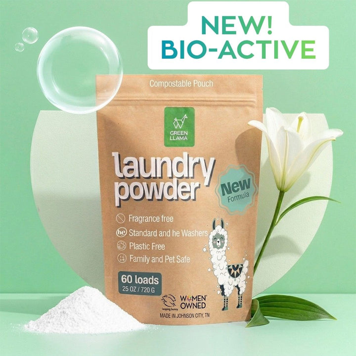 Fragrance-free laundry powder in kraft compostable pouch with powder scoop and white linens
