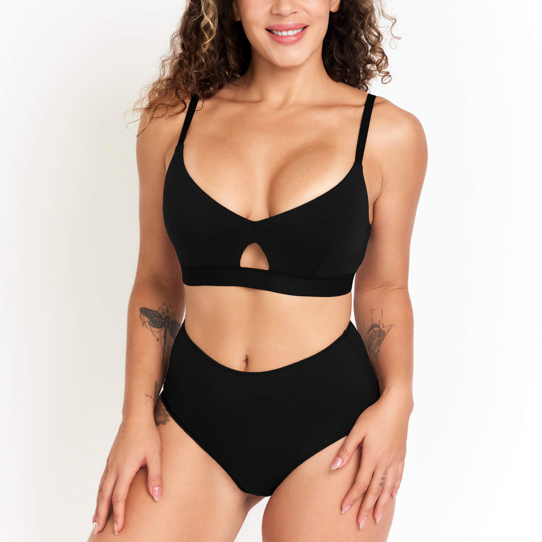High-rise brief underwear in black, front view with high waist and cutout