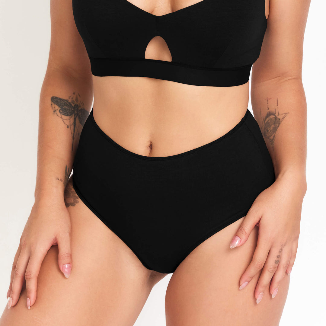 High-rise brief underwear in black, with seamless look and front cutout