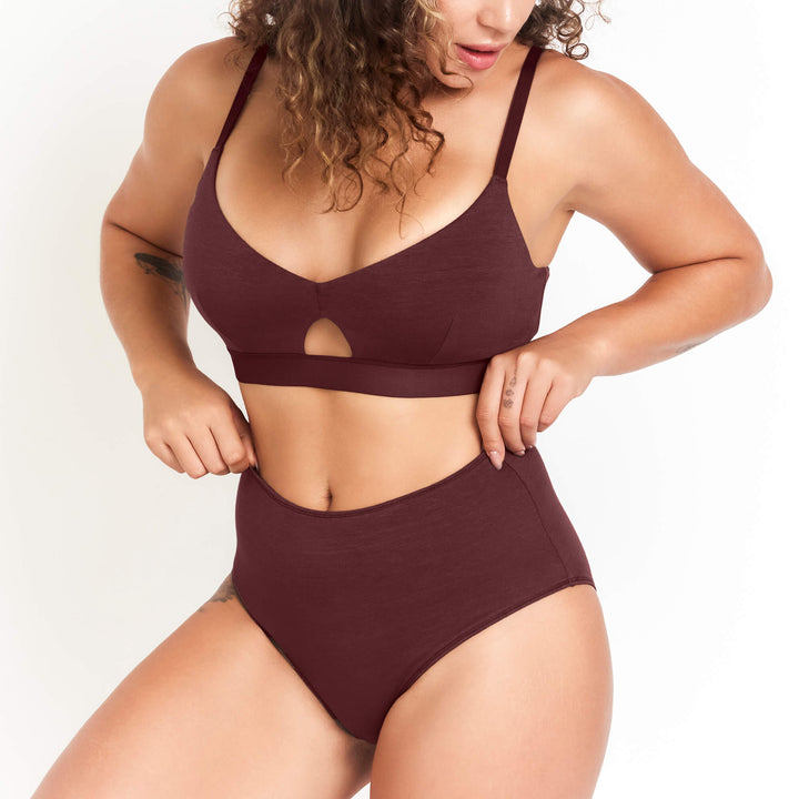 Dark maroon high-rise briefs with front keyhole cutout and full-coverage leg.