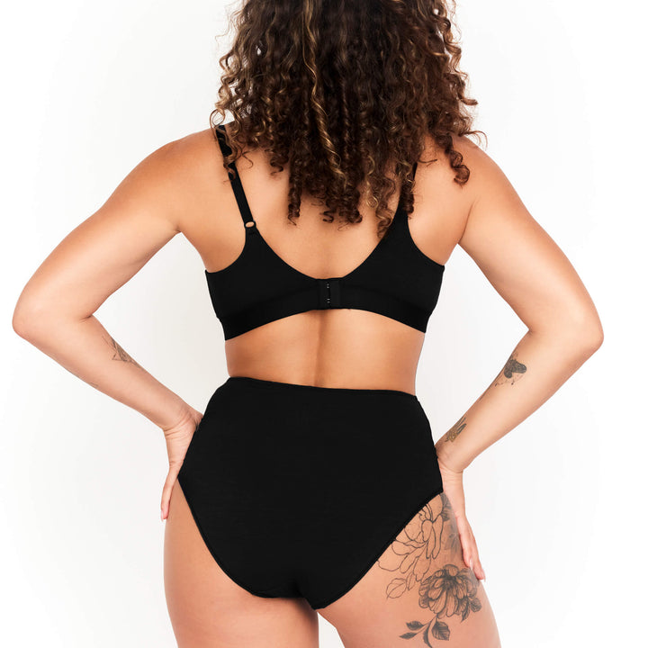 High-rise brief underwear in black, shown from the back with full coverage