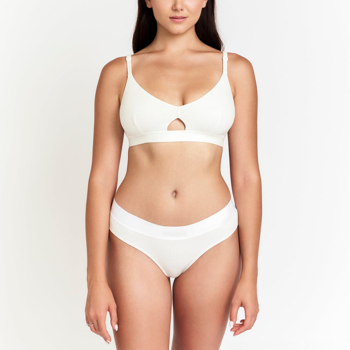 White mid-rise brief with smooth bikini cut and centered leg seams
