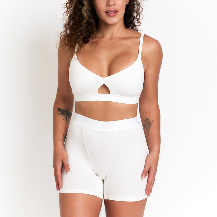 Milk botanical dye boxer briefs with front cutout seam detail and short-leg fit