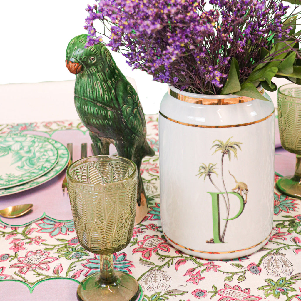 Olive green leaf-pattern glass goblets with short stems and round bases