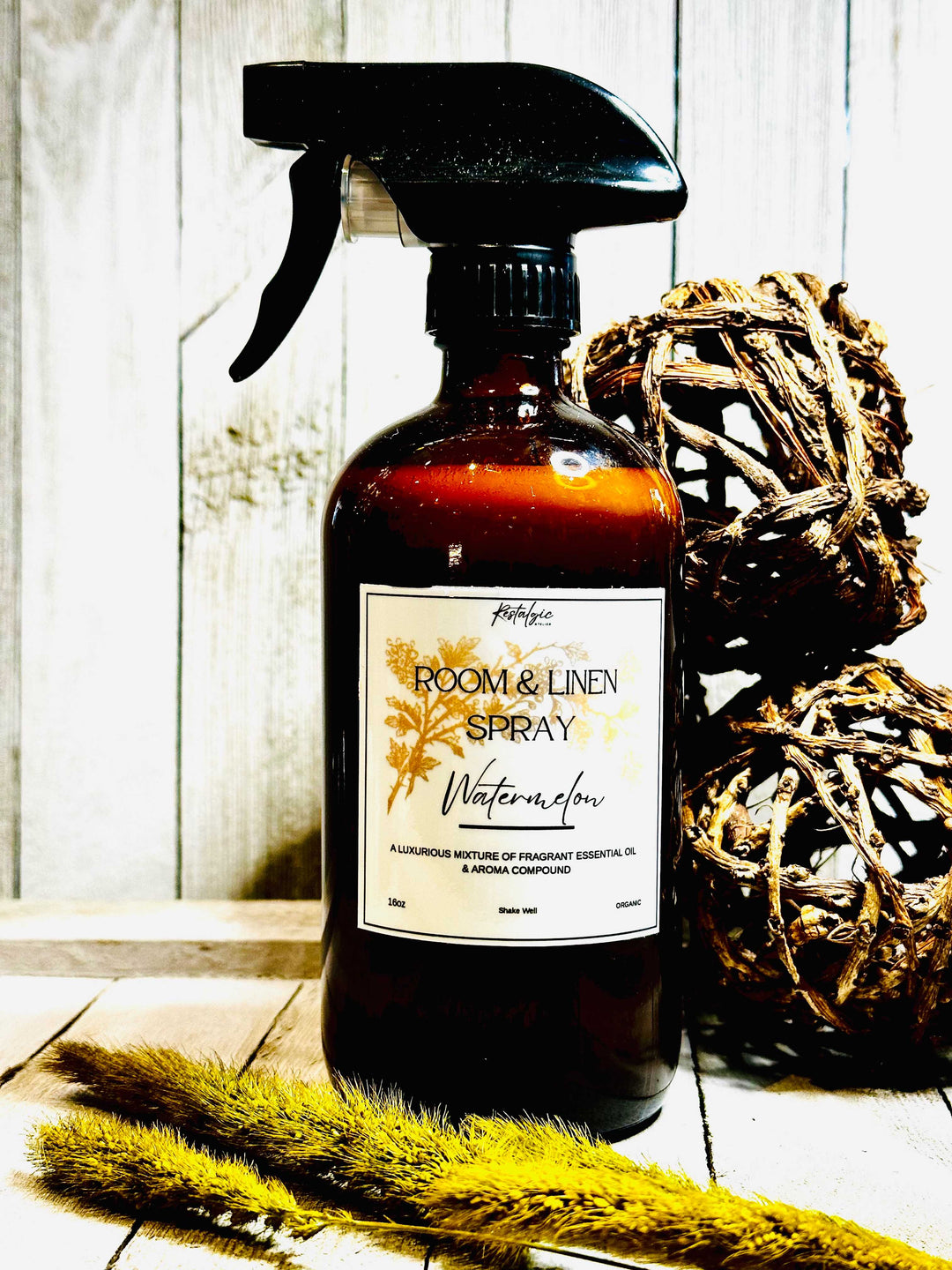 Amber glass room &amp; linen spray bottle with black trigger sprayer and dark floral label