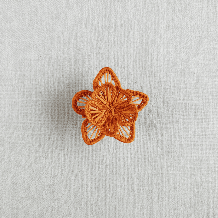 Pink woven star flower napkin ring, handwoven iraca