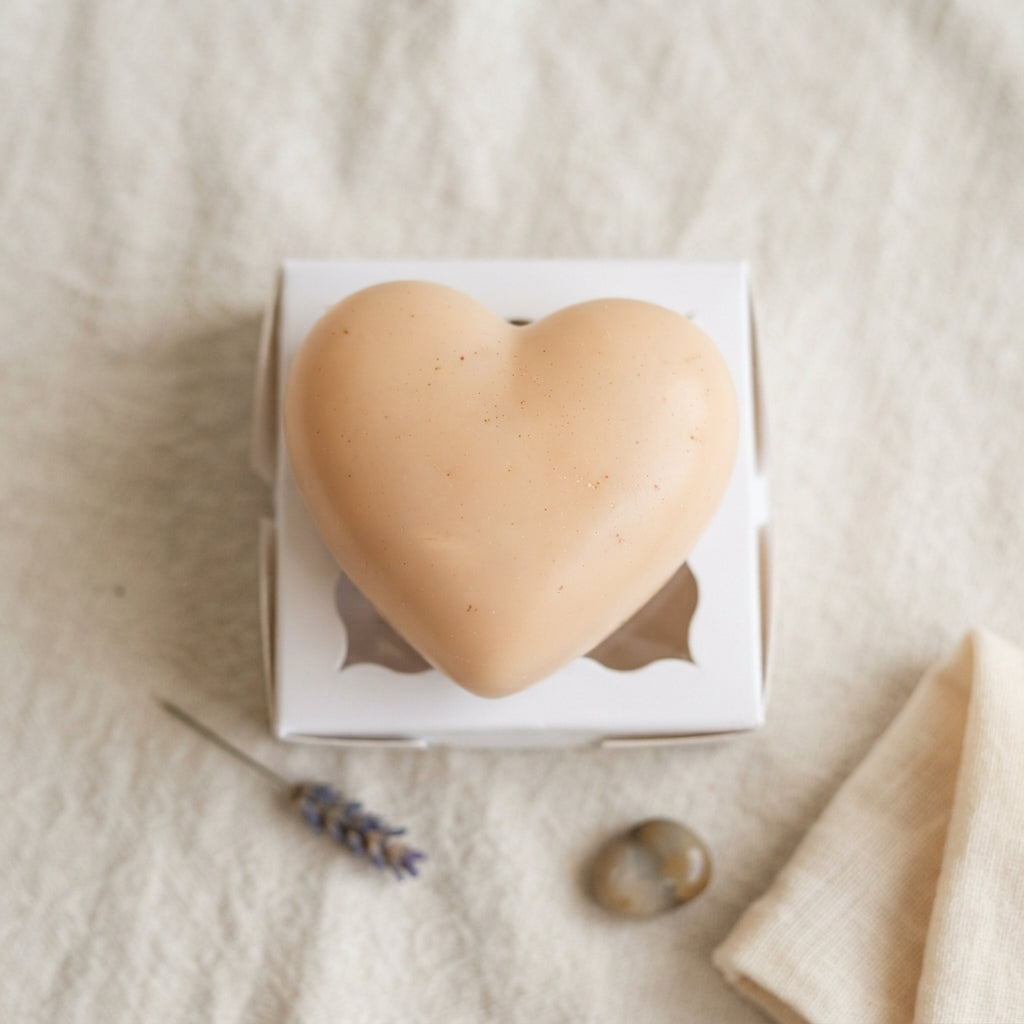 Tan heart wax freshener in white gift box with heart-shaped cutout