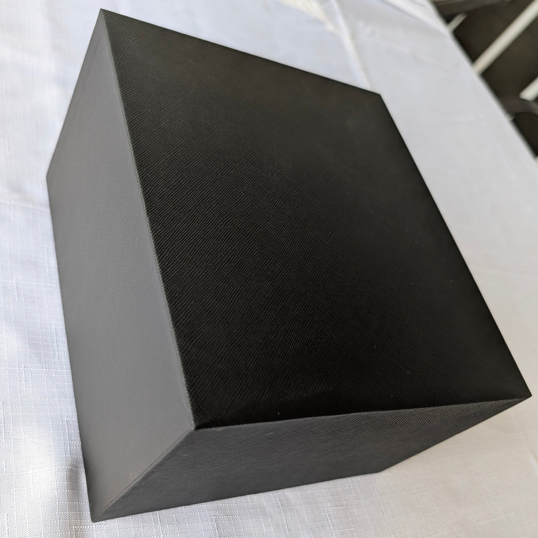 Black textured insert panel for a light therapy mask system