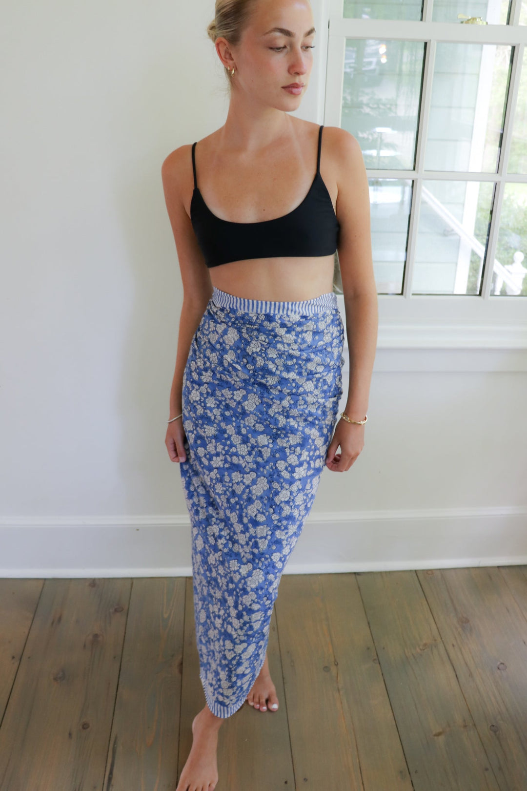 Blue floral pareo wrap skirt with smocked waistband and ankle-length blue design