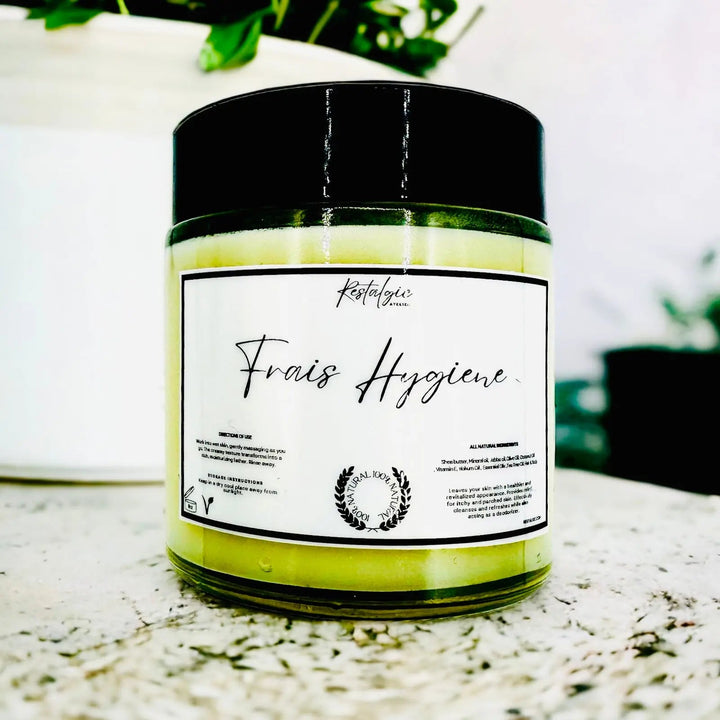 Frais hygiene body butter jar with black lid and green cream, white ingredient label