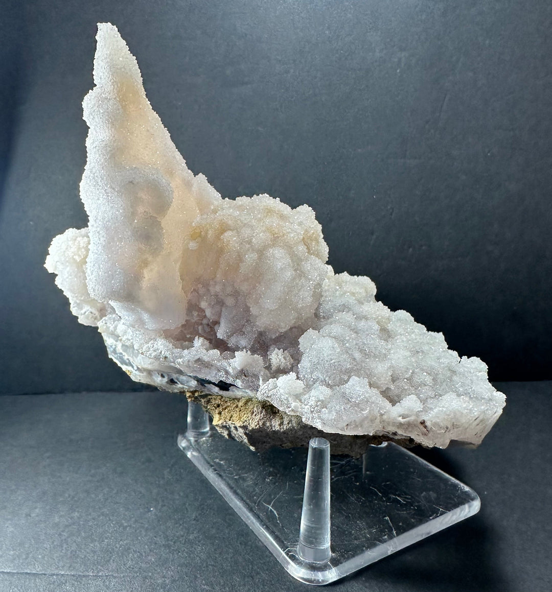 Calcite druse cluster on agate base, tall upright crystal and smaller points
