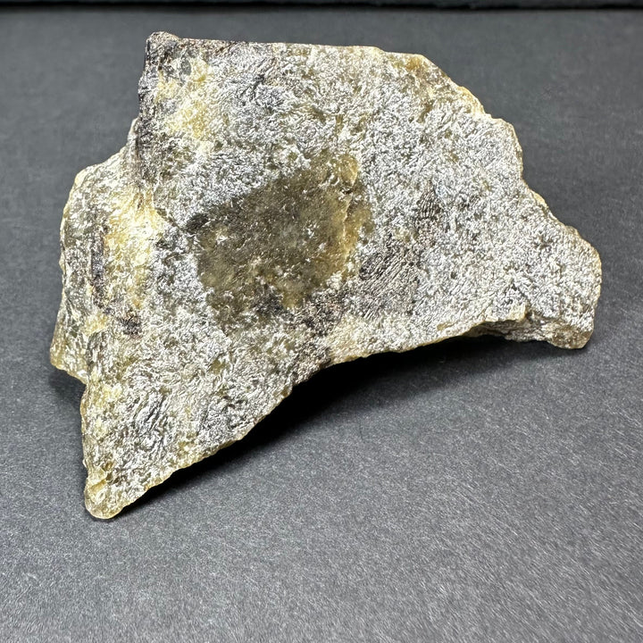 Labradorite rough stone, broad piece with speckled gray and subtle yellow-gold tones