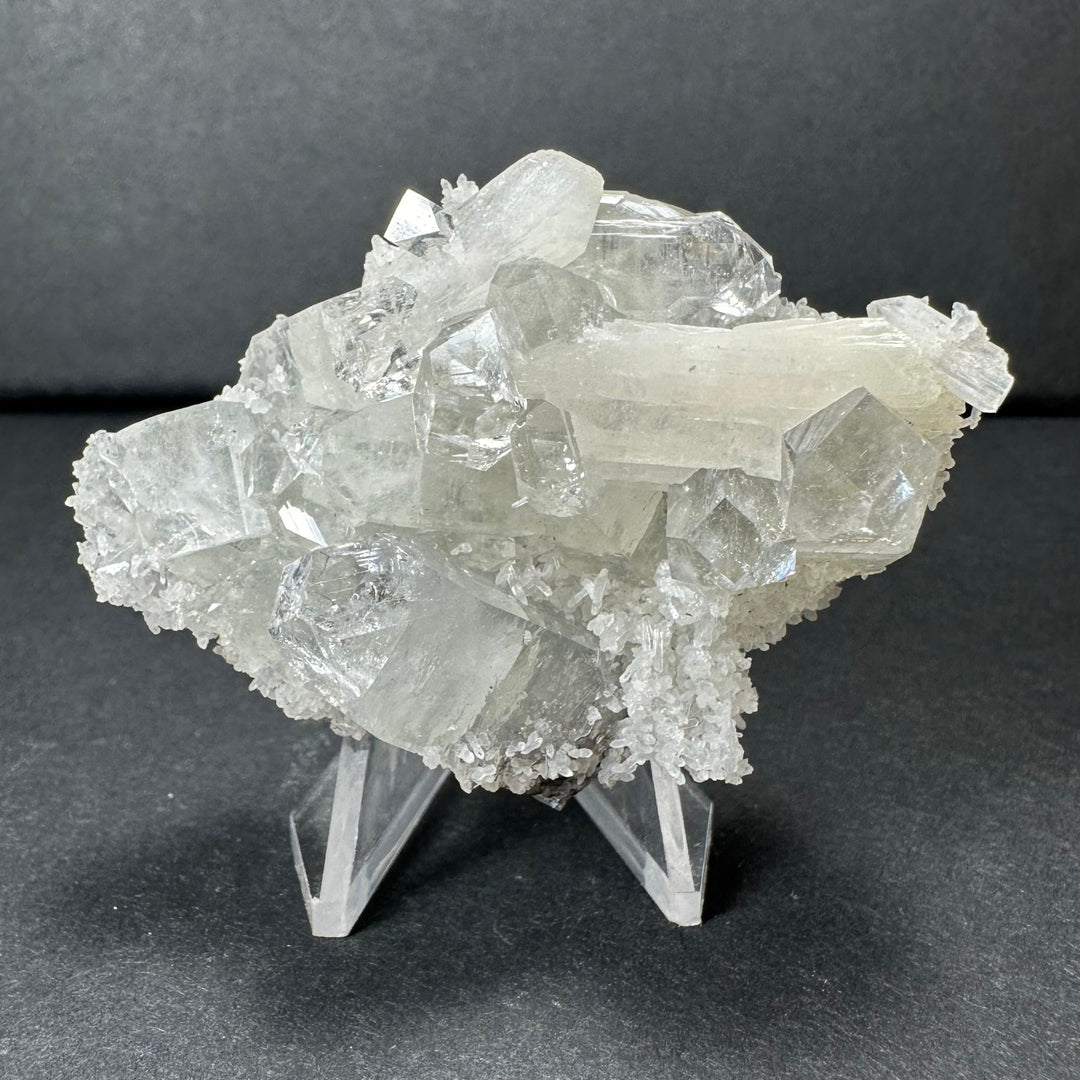 Clear crystal apophyllite cluster with white stilbite, on clear stand