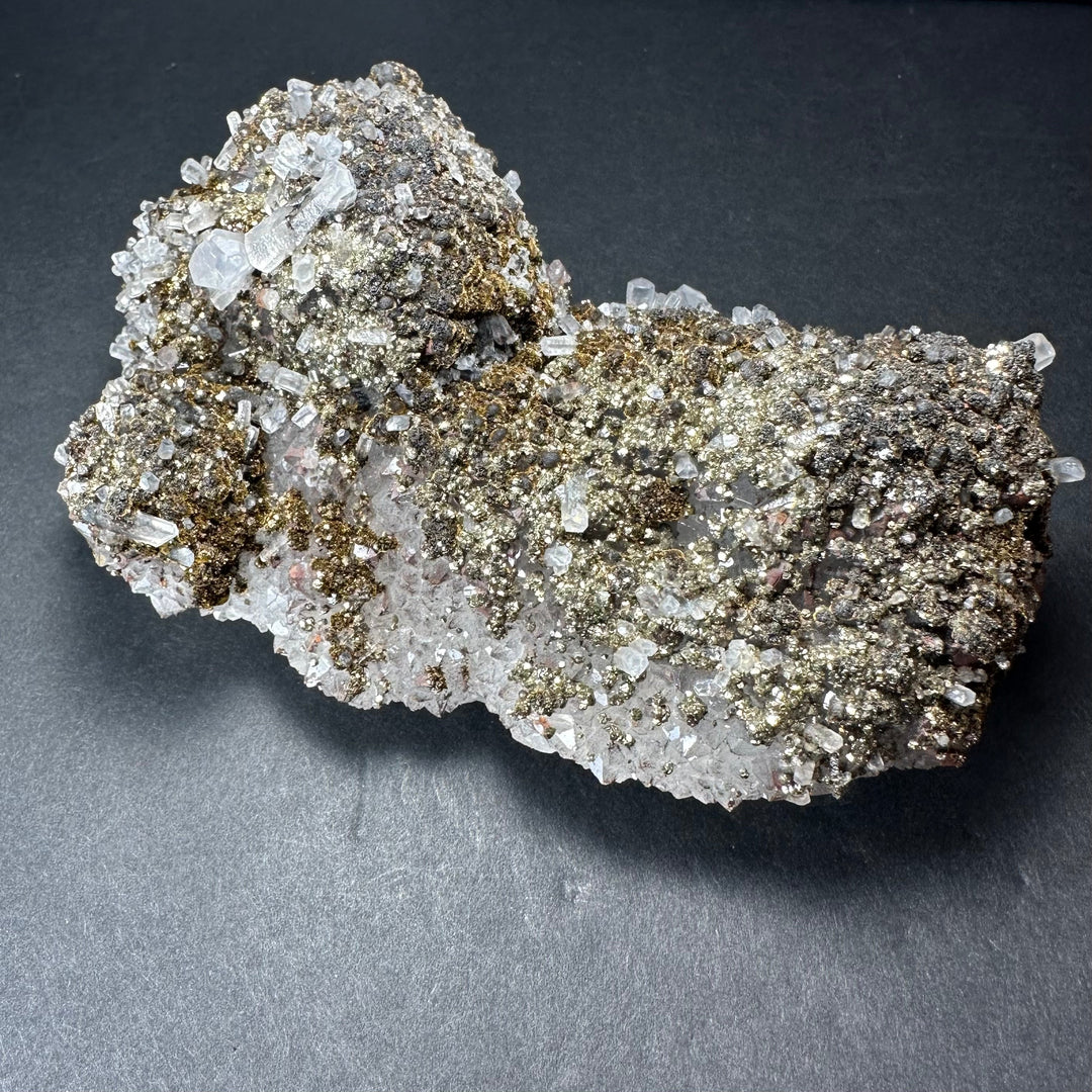 Marcasite on calcite mineral specimen with silver-white calcite and gold pyrite-like specks