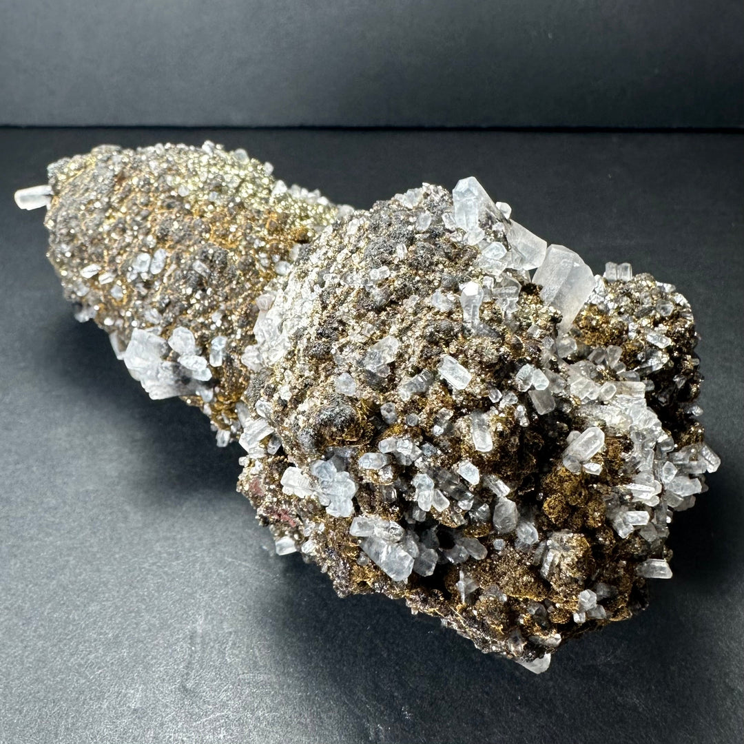 Marcasite on calcite mineral specimen, long clear crystals over gold-toned matrix