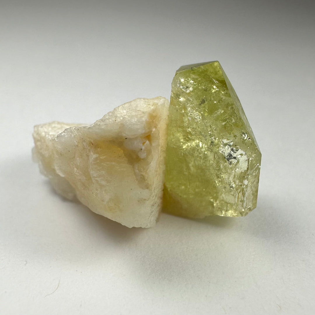 Green Brazilianite crystal with milky white Albite, rough clustered stones