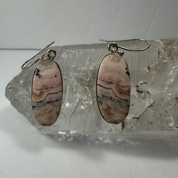 Oval rhodonite dangle earrings with silver hooks, pink and black marbled stone