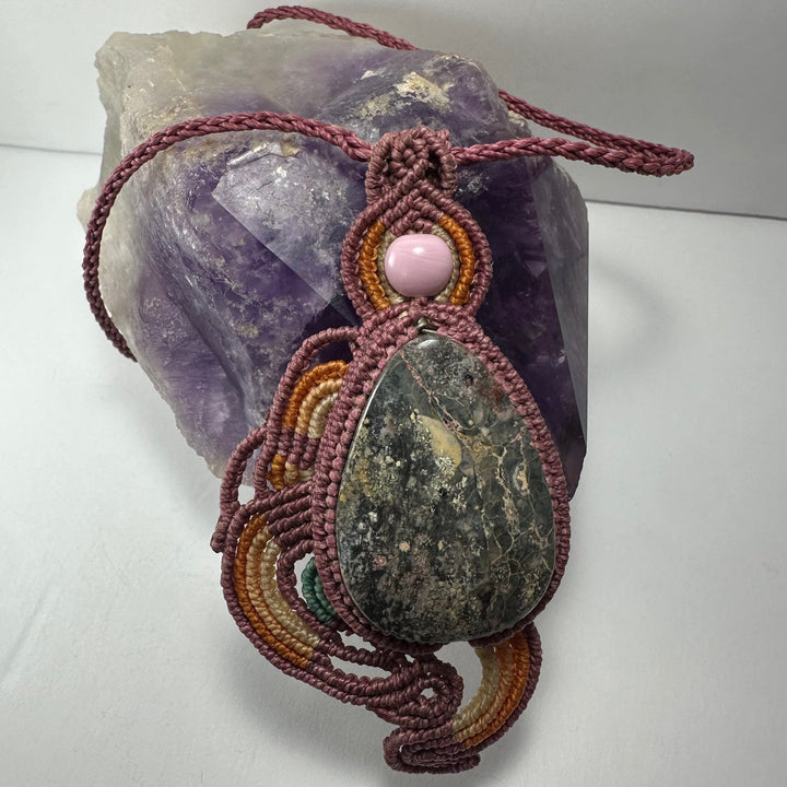 Handmade macrame necklace with burgundy cord, teardrop green stone and pink bead