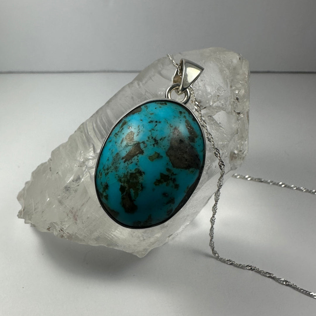 Silver oval turquoise stone pendant with bail and chain