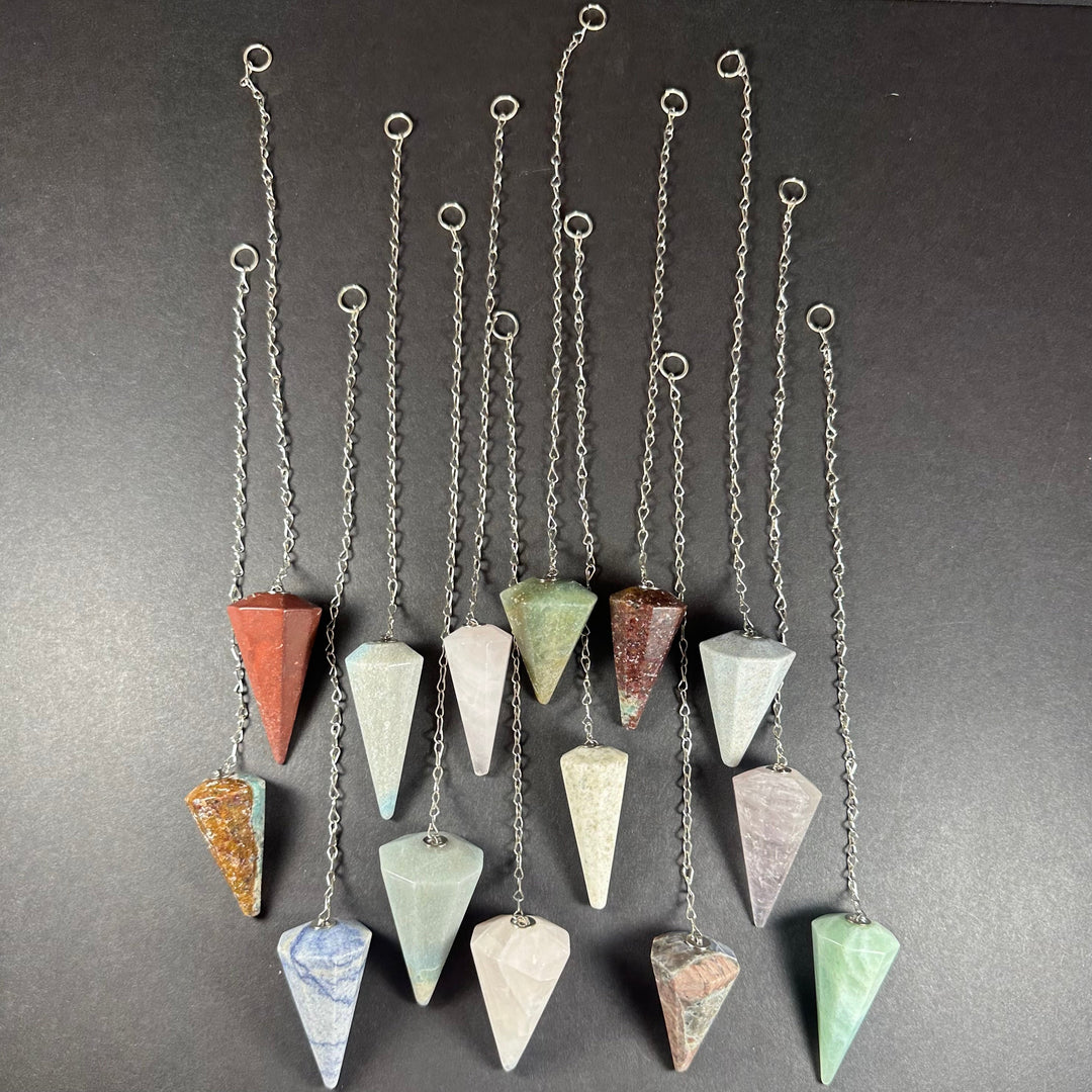 Stone pendulum necklace set with mixed-color faceted teardrop gemstones on silver chains