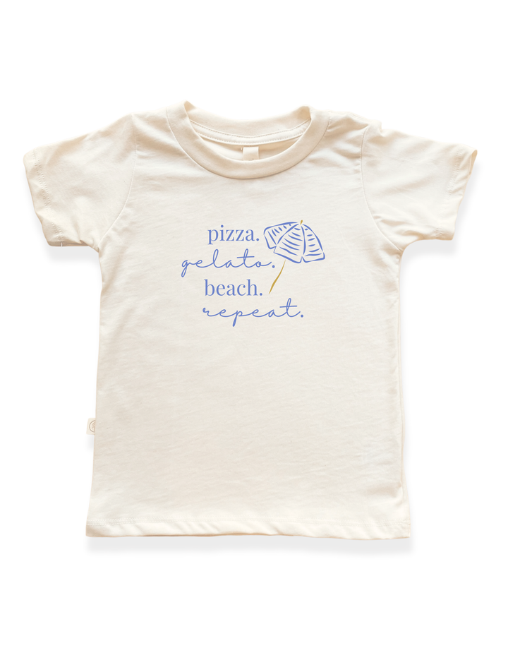 Kids organic cotton T-shirt, cream, pizza gelato beach repeat graphic on front.