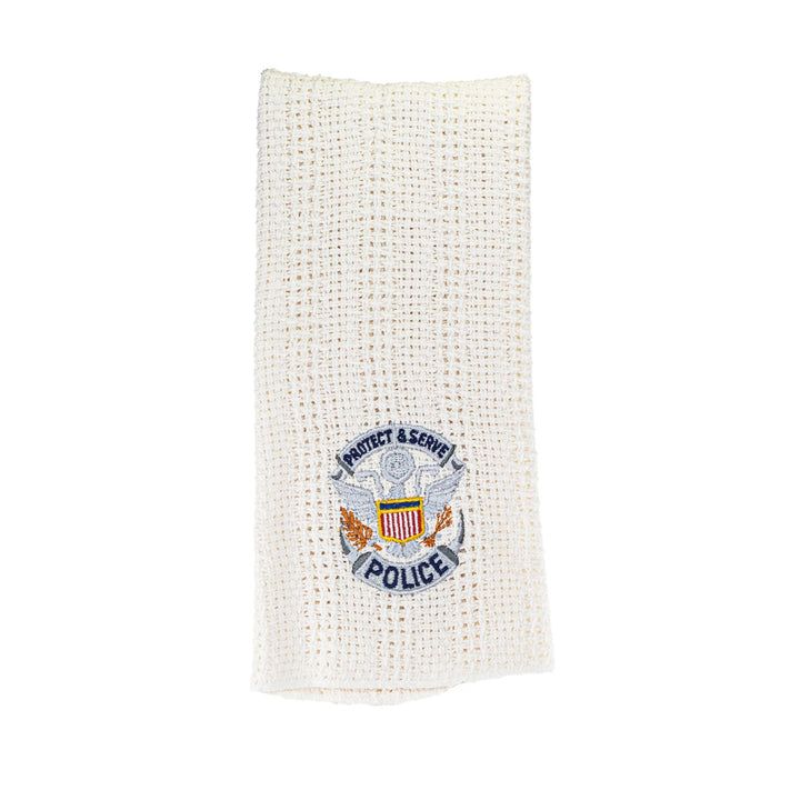 Cream cotton kitchen towel with embroidered Police badge emblem