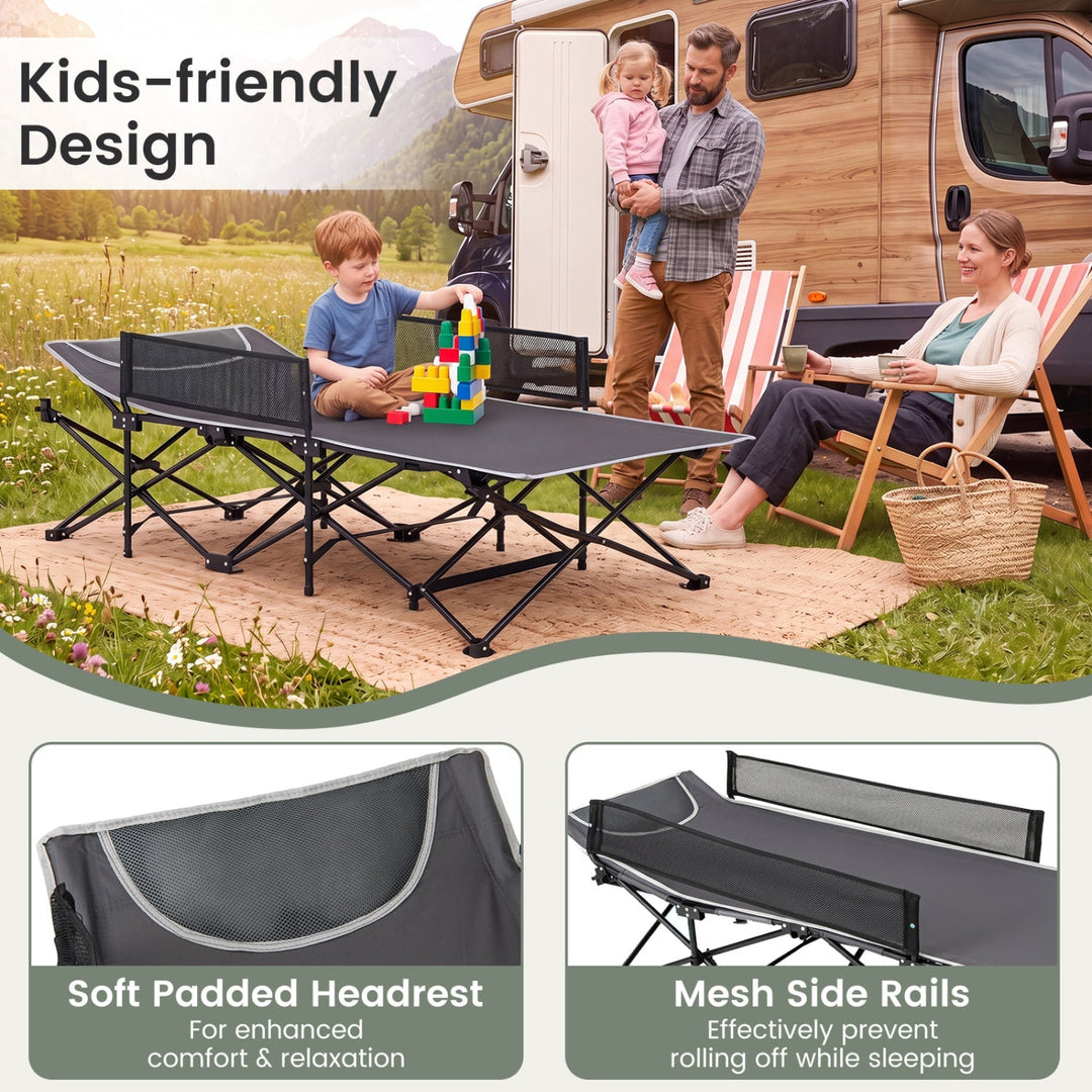 Dark gray folding camping cot with padded headrest and mesh side rails