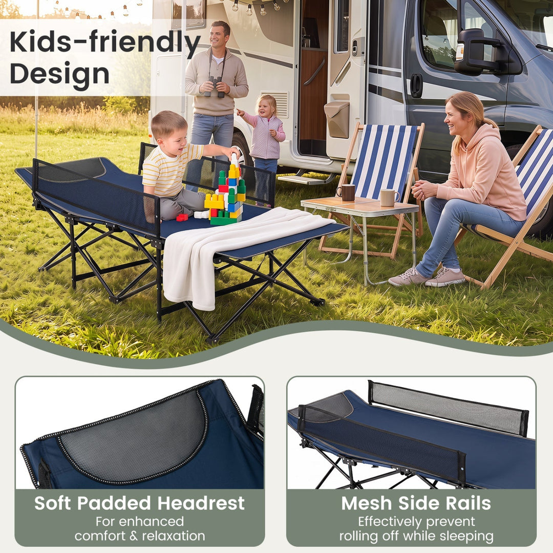 Navy folding camping cot with soft padded headrest and mesh side rails