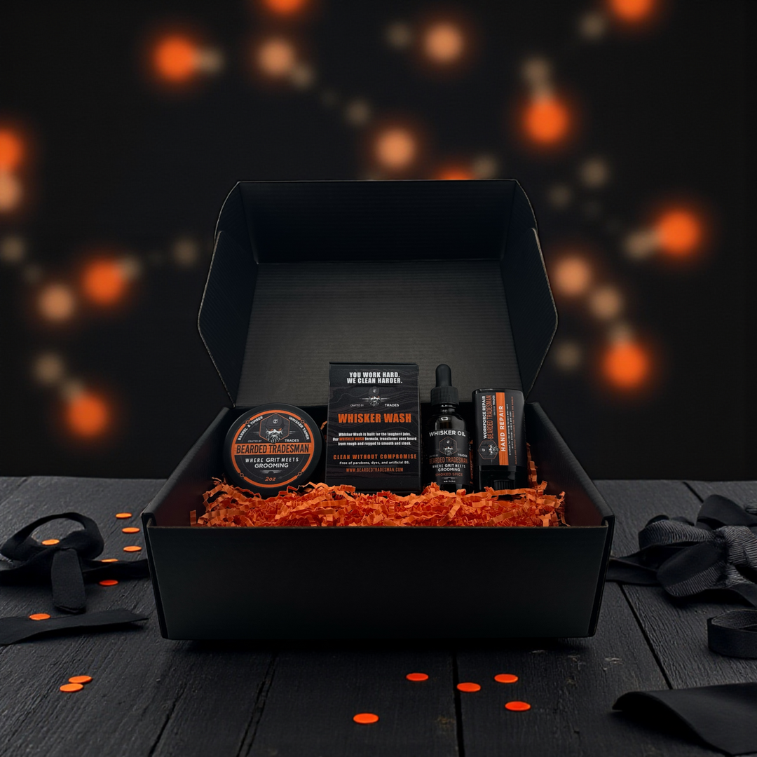 Premium GRIT whiskey gift set in black box with bottles, jar, and accessories