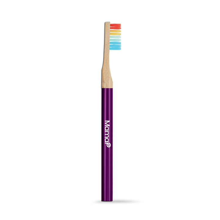 Revolve manual toothbrush; purple handle with wood neck and multicolor bristles