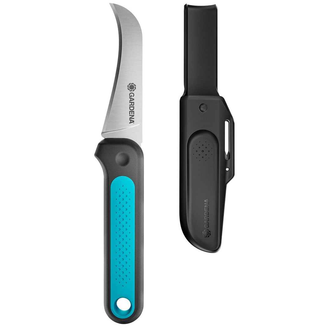VeggieCut scissors with blue textured handle and black sheath, angled views