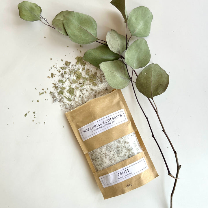 Botanical bath salts kraft pouch with RELIEF label and white salt inside