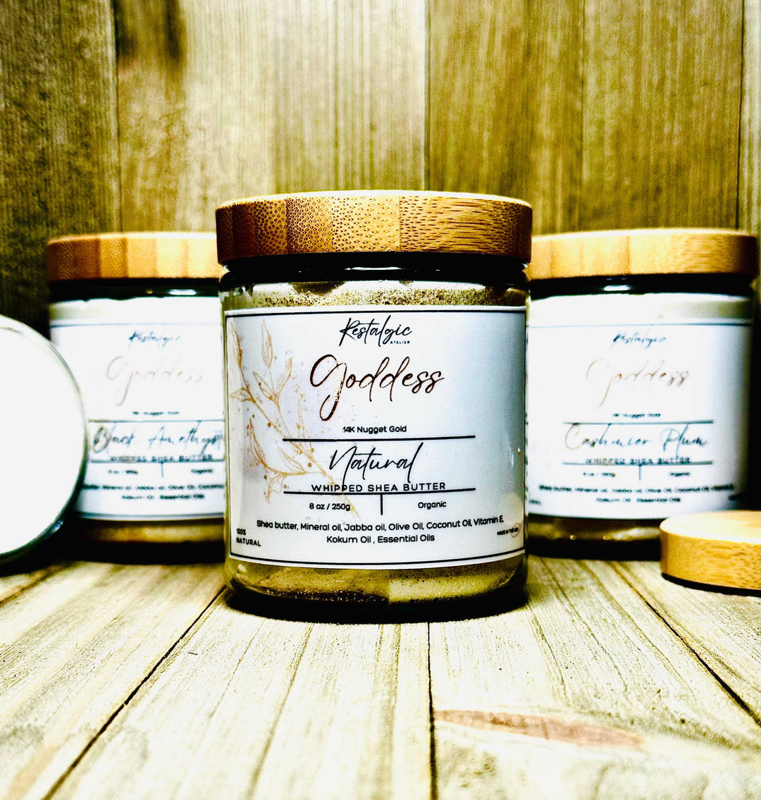 Shimmer body butter jar with gold cap, white label, and wood-toned lid surround