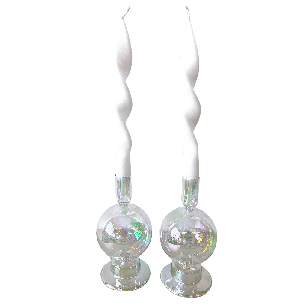 Pair iridescent glass candle holders with prism bauble bases and tall stems