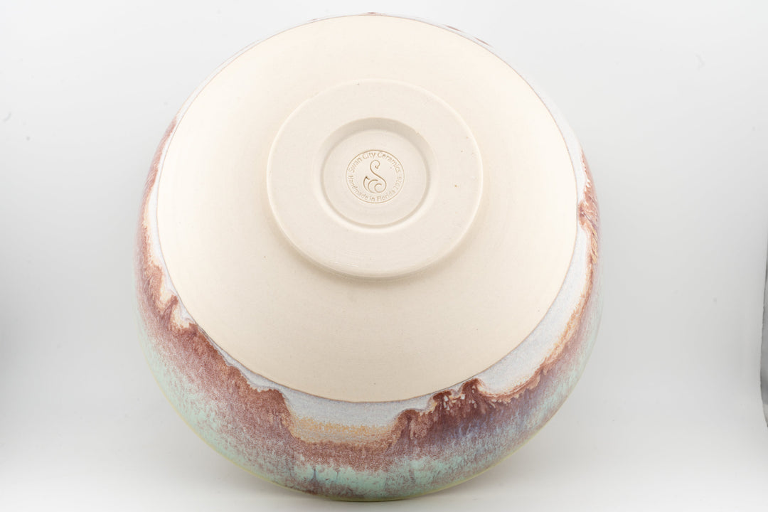 Ceramic large bowl top view with round foot and multicolor speckled rim