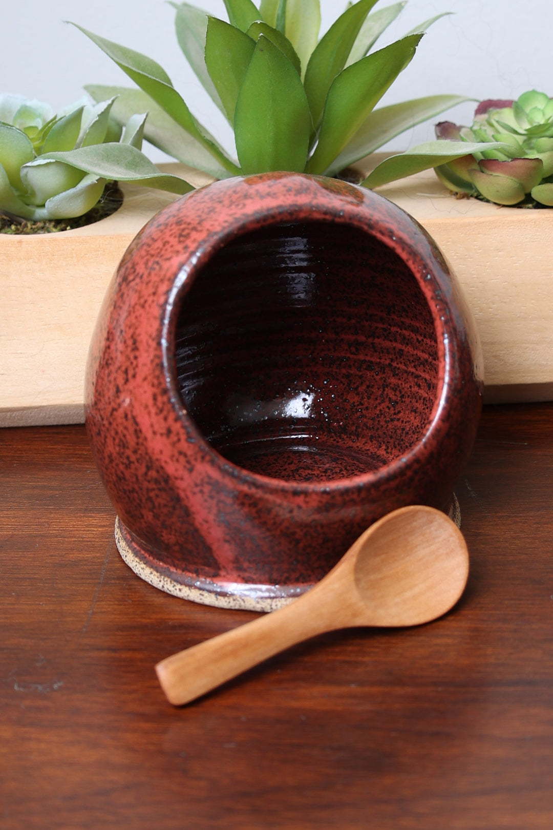 Handmade stoneware salt cellar, speckled red glaze, open bowl with wooden scoop