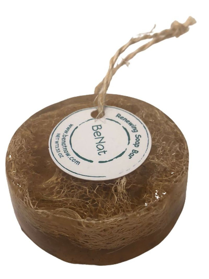 Loofah soap bar on rope with round BeNat label, dark brown.