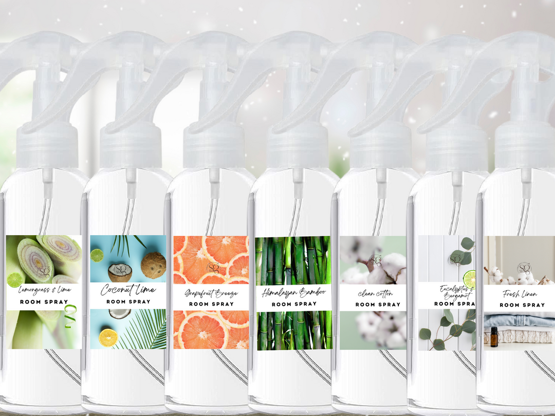 Set of white room spray bottles with trigger tops, arranged in rows