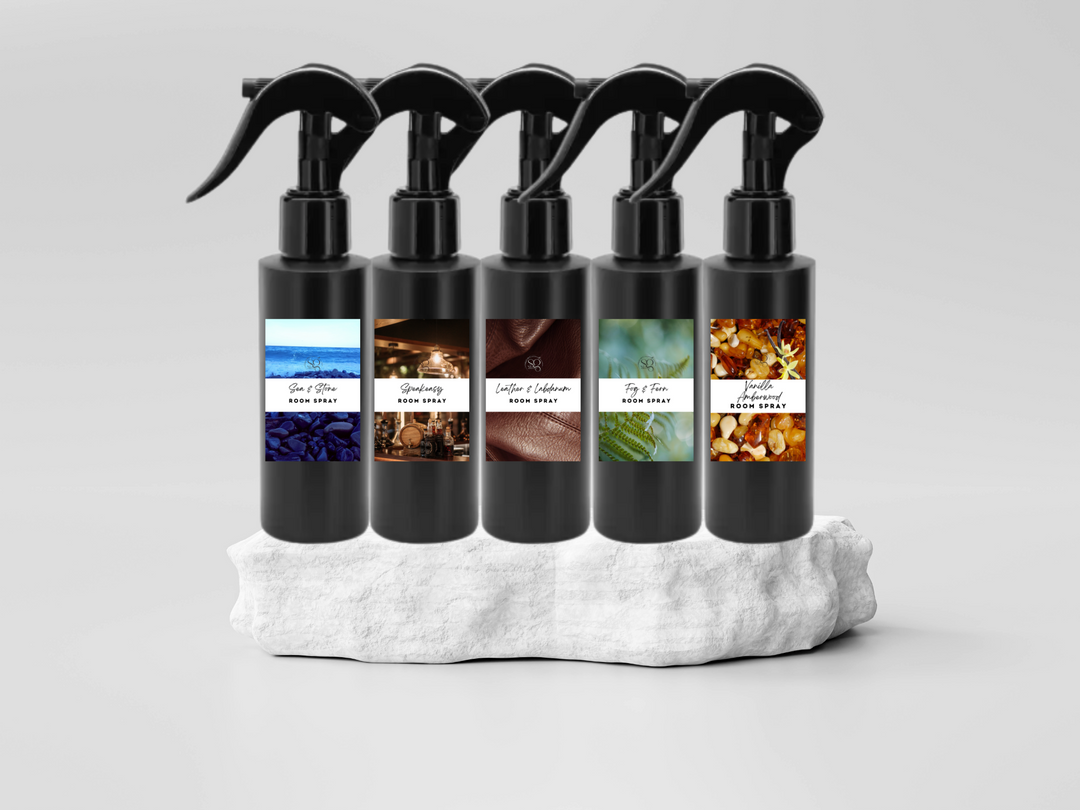 Pack of black room spray bottles with curved trigger nozzles, assorted labels