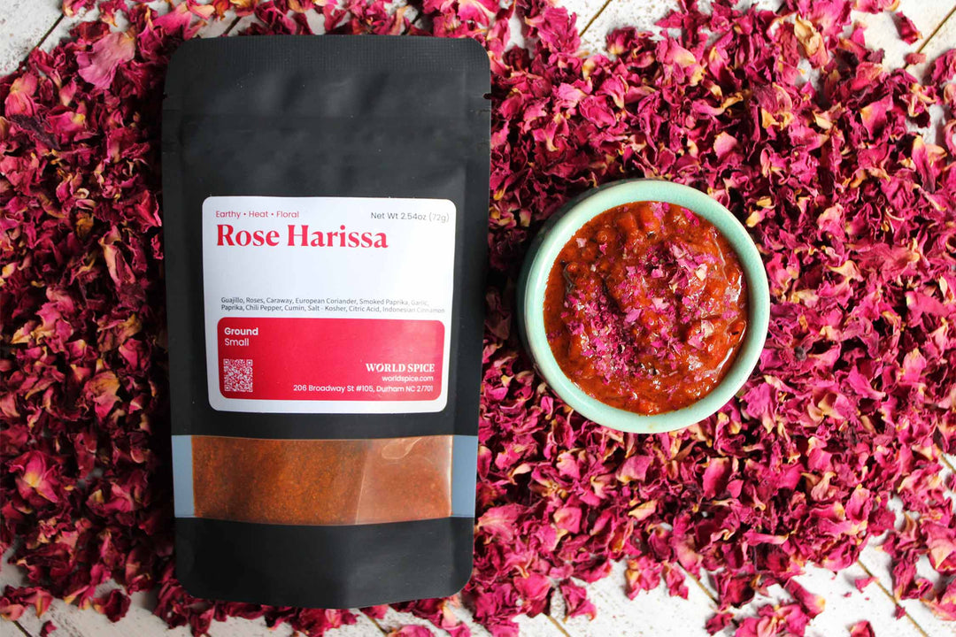 Rose Harissa ground spice sachet with a bowl of red blend